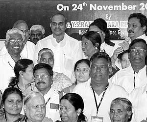 Chief Minister Y.S. Rajasekhara Reddy with the first batch of pilgrims leaving for Jerusalem in Hyderabad on Monday.