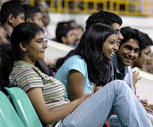 Spectators cheering for the Chennai Open match