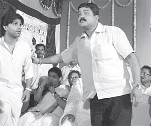 Sandeep Ray (left) and father and BJP leader Dilip Ray (Right) formally join the party in presence of MP Dharmendra Pradhan