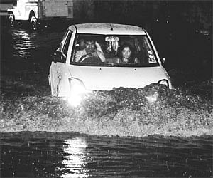 Heavy rain floods twin cities