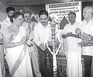 Justice T R Ramachandran Nair inaugurating the Snehasangamam organised by the Customs Recreation Club at the Palluruthy Relief Settlement in connectio