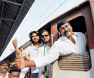 GLAMOROUS LAUNCH: Actor Allu Arjun, PRP chief Chiranjeevi and his son and filmstar Ramcharan Tej in an upbeat mood prior to the flagging off of the Pr