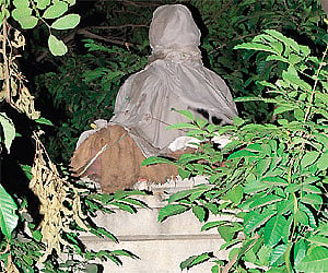 The statue of Thiruvalluvar that was ready to be unveiled but never was, has since been living under cover.