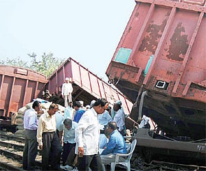 The wagons of a goods train which derailed at Malkajgiri railway station on Monday.