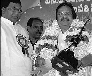 Home Minister K.Jana Reddy presenting the NTR award for 2007 to director Dasari Narayana Rao and Raghupathy Venkaiah award to Tammareddy Krishnamurthy