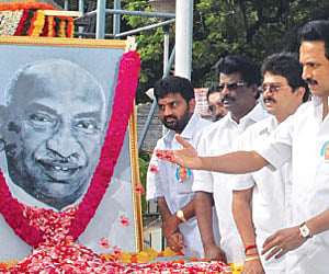 Deputy Chief Minister M K Stalin offering floral tributes to former Chief Minister Kamaraj, on the ocassion of his birth anniversary, in the city on W