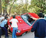 The car of Nagam Janardhan Reddy being attacked.