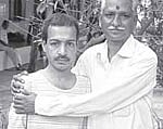Sivakumar with his brother-in-law Paramdhamam from Chennai. He reunited with his family who came to pick him up from the Palluruthy Settlement in Koch