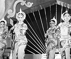 Artistes perform Odissi at the Dhanu Yatra in Bargarh on Monday.