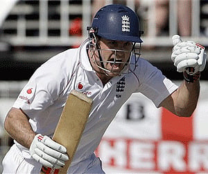 England's captain Andrew Strauss reacts after playing a shot to reach a century during the first day of the third cricket Test match. (Photo: AP)