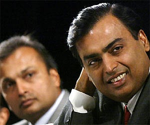 Mukesh Ambani and Anil Ambani is seen in this file photo in Mumbai in this June 24, 2004 file photo. REUTERS