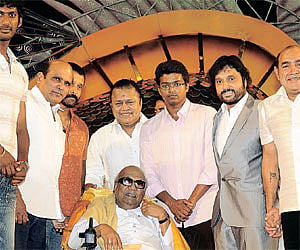 Chief Minister M Karunanidhi with the members of the Film Employees Federation of South India, after being felicitated with the title Ulaga Kalai Pada
