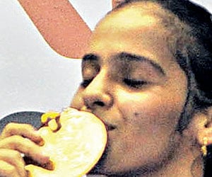 Saina beats world no.Three to win Indonesian Open