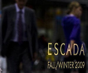 People walk past a store for Escada fashion house in Berlin, August 12, 2009. (Reuters)