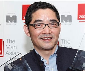 Chinese writer Su Tong poses after he won the Man Asian Literary Prize in Hong Kong. AP
