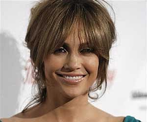 Singer and actress Jennifer Lopez arrives at the Noche De Ninos benefit gala in Beverly Hills, Calif. on Saturday, May 9, 2009. (AP Photo)