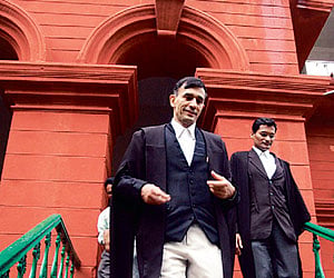 Advocate General Uday Holla, who resigned his post, leaves the High Court in Bangalore on Monday.