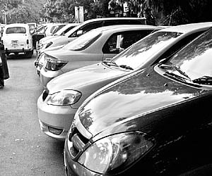 Cars parked near the Apollo Hospitals where a muti-level car parking facility is slated to come up.