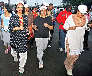 Wives of IPS officers participating in a run on Friday. it was part of a curtain raiser to the Chennai International Half Marathon that is scheduled.