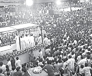 The body of Archbishop Daniel Acharuparambil being taken to a specially-prepared vehicle for a procession before the burial to be held at St Francis
