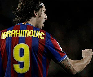 Barcelona's Zlatan Ibrahimovic of Sweden celebrates after scoring against Real Madrid during their La Liga soccer match at the Camp Nou stadium. (AP)