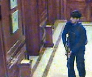A gunmen patrols the corridor of the Mumbai Taj during the 26/11 terror attack. Express File Photo