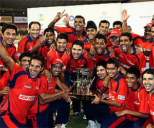 Air India Red Captain Yuvraj Singh with the team mates celebrates their win over Air India blue during the BCCI corporate cup final match. PTI