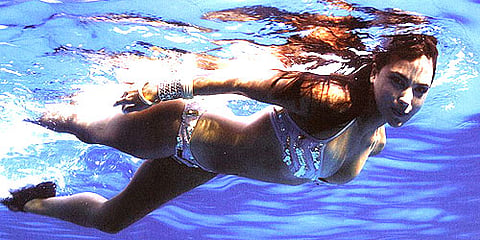 Laura Dutta in Blue.