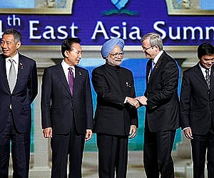 Australia's Prime Minister Kevin Rudd, greets India's Prime Minister Manmohan Singh at the photo session of the 4th East Asia Summit. (Photo: AP)