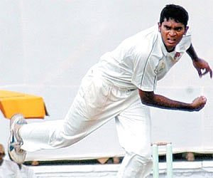 Avishkar Salvi in action en route to claiming 5-31 to bring Mumbai back into the game against Karnataka in the Ranji Trophy final in Mysore on Tuesday