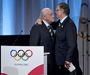 Joao Havelange, left, is embraced by Rio 2016 bid president Carlos Arthur Nuzman. (AP/File)
