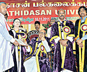 P Subburathina Bharathi, great grandson of Bharathidasan, receiving his doctorate from Governor K Rosaiah during the annual convocation.