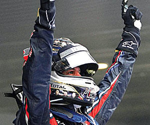 Vettel exults after winning the race