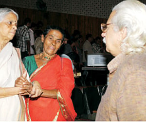 Social worker Daya Bayi (centre) having a word with film-maker Adoor Gopalakrishnan ahead of the screening of the documentary ‘Ottayal’ on her life in
