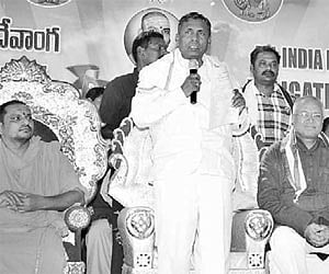 Union minister of state for railways KH Muniyappa speaking at the national convention of the Devanga community in Rajahmundry on Sunday. | Express Pho
