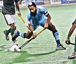 Indian captain Rajpal Singh in action against Pakistan in New Delhi on Sunday.