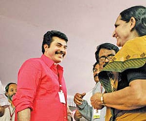 Actor Mammootty meeting his senior at college, Meharu Moideen, during Maharajakeeyam 2012, held at Maharaja’s College, in Kochi on Saturday. EPS
