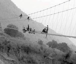 The suspension bridge under construction near Chakkaguda village, on the outskirts of Rayagada town I Express Photo