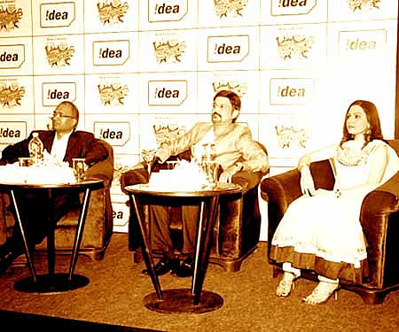 (From right) Siva Ganapathi, Actor Ramesh Aravind and actress Mona Parveresh at the audio launch