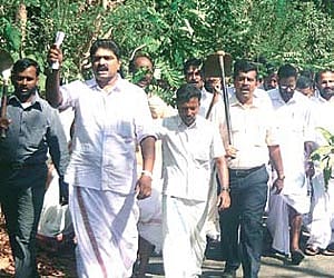 A protest march taken out by the Erayamkudi Janakeeya Samiti, led by T N Prathapan MLA, against filling of paddy fields, on Monday