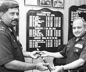 Major General A K Pradhan handing over the baton to GOC Major General K S Venugopal at the K & K Sub-Area in Bangalore on Friday | Suresh