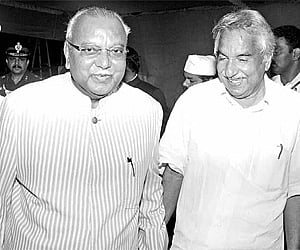 Chief Minister Oommen Chandy receiving new Governor M O H Farook at Thiruvananthapuram airport on Wednesday | Express