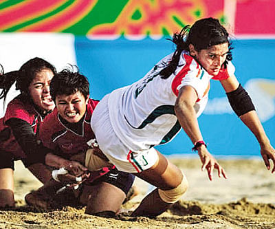 Mamata Poojary in action; with her parents, brother and sister (below)