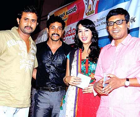 (From left) Actors Kitty, Prem, Sanjana and director Ravindra at the relaunch of the audio for I Am Sorry Mathe Banni Preethsona'.