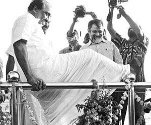 Excise and Ports Minister K  Babu ventures for a daring jump from the 500-tonnes SWL Bollard Pull Test facility in Vizhinjam. (EPS)