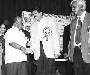President of Jawaharlal Nehru Centre for Advanced Scientific Research C N Rao greeting recipients of awards | KPN