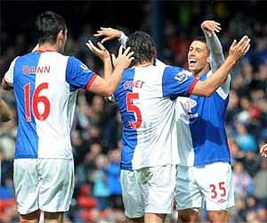 Blackburn Rovers' Scott Dann, Gael Givet and Jason Lowe celebrate their 4-3 victory. AP