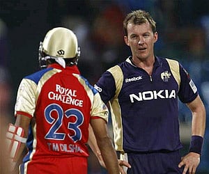 Brett Lee looks at Tillakaratne Dilshan after bowling a delivery to him during their CLT20 match in Bangalore on Thursday, September 29, 2011. (AP)