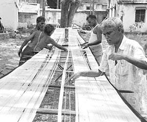 Weavers preparing the yarn at a khadi factory in Srikakulam district. | Express Photo