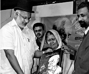 express  Education Minister M A Baby receiving a caricature of Vaikom Muhammad Basheer at a function held at Alakapuri hotel on Sunday. Basheer’s wife